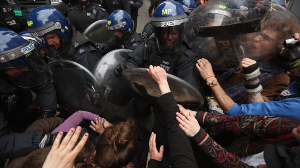 Riot police clash with protesters in Golden Square in London yesterday during a demonstration ahead of next week’s G8 summit in Northern Ireland: Photograph: Oli Scarff/Getty Images