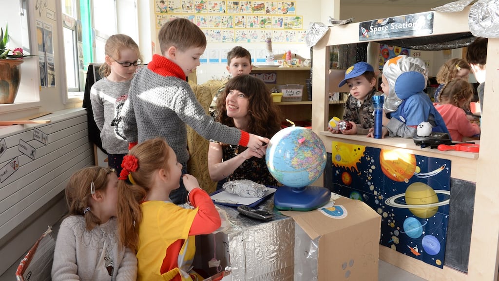 Sorcha Brennan, teacher at Glasnevin Educate Together, at play with junior infants. Photograph: Dara Mac Dónaill