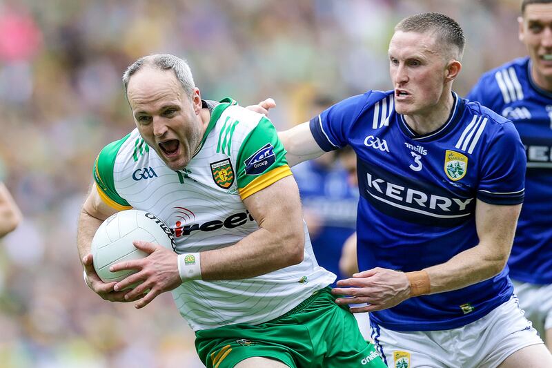 Donegal's Michael Murphy tackled by Jason Foley of Kerry. Photograph: Laszlo Geczo/Inpho