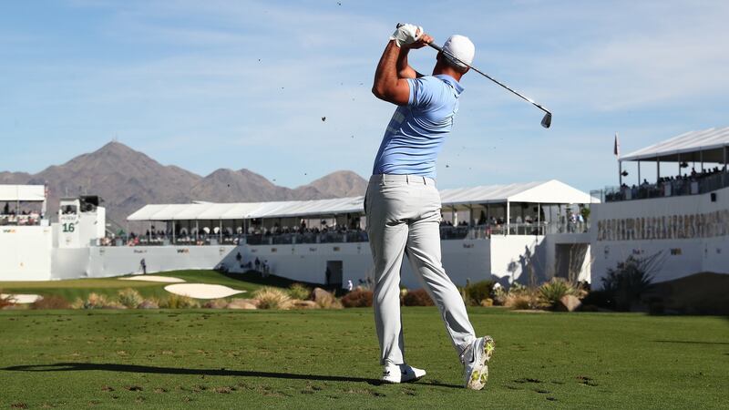 Brooks Koepka  plays his tee shot on the par-3 16th hole during the final round of the Waste Management Phoenix Open at TPC Scottsdale in Arizona. Photograph:  Abbie Parr/Getty Images
