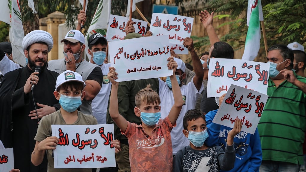 Lebanese Muslims carry placards reading ‘Except God’s messenger’ during an anti-France protest in front the French embassy in Beirut. Photograph: Nabil Mounzer/EPA