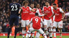 Arsenal beat wasteful West Ham to keep European hopes alive