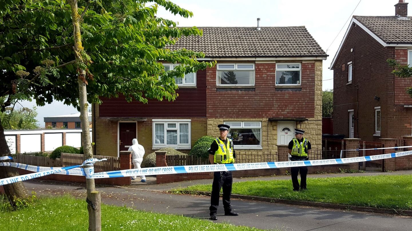 Police guard the house in Lowood Lane where Tommy Mair, the suspect arrested over the shooting of Labour MP Jo Cox, lives in Birstall, West Yorkshire. Photograph: Dave Higgens/PA Wire