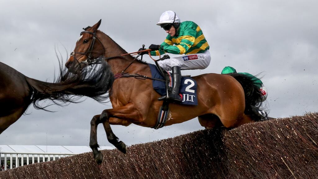 Barry Geraghty on board Defi Du Seuil clears the last on the way to winningthe JLT Novices’ Chase at Cheltenham. Photograph: Dan Sheridan/Inpho