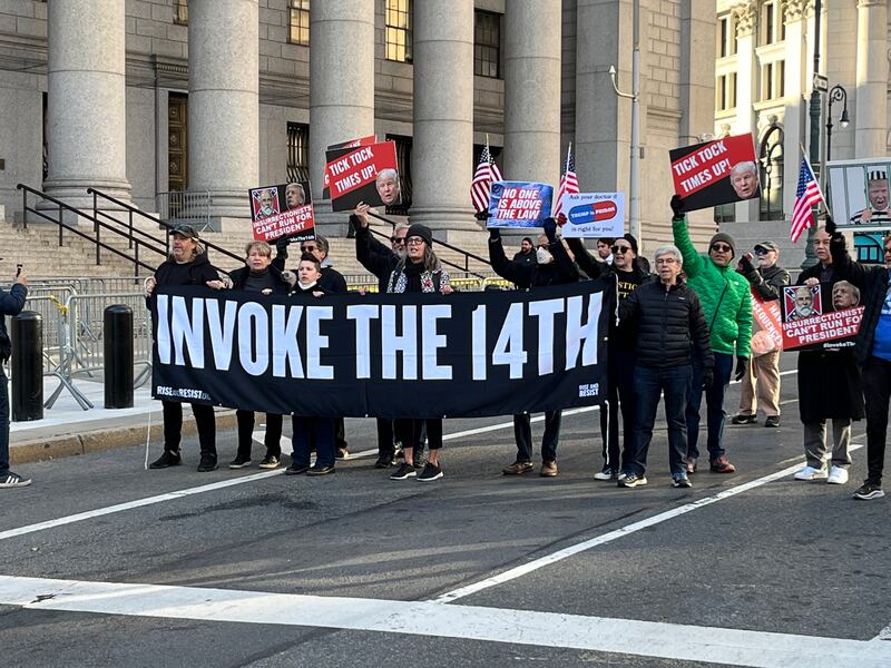 Anti-Trump protesters gather outside the state supreme court in New York.
