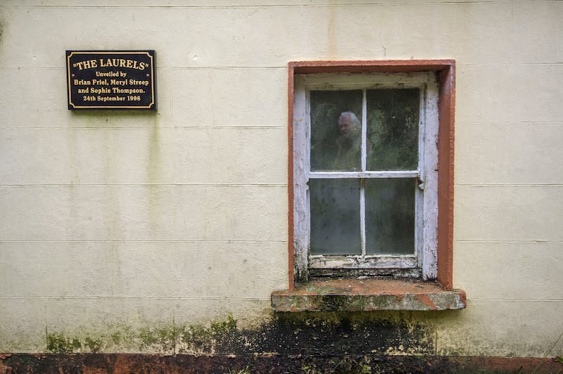 A plaque on the wall unveiled by Brian Friel, Meryl Streep and Sophie Thompson in 1998. The Laurels cottage in Glenties was the original home of the five Mundy sisters where Friel played as a child and based his play Dancing at Lughnasa on. Photograph: Brenda Fitzsimons