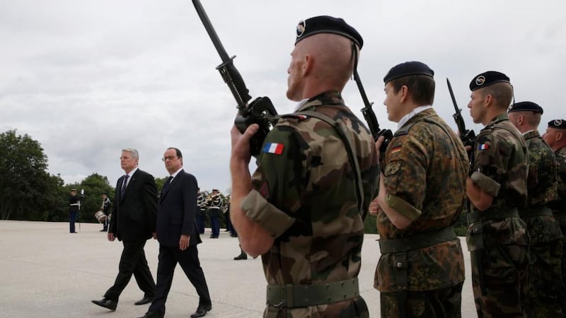 Francois Hollande and Joachim Gauck attend a ceremony to commemorate the centenary of the start of the first World War One at the Vieil Armand ‘Hartmannswillerkopf’ battlefield in the Alsace region. Photograph: Christian Hartmann/Reuters