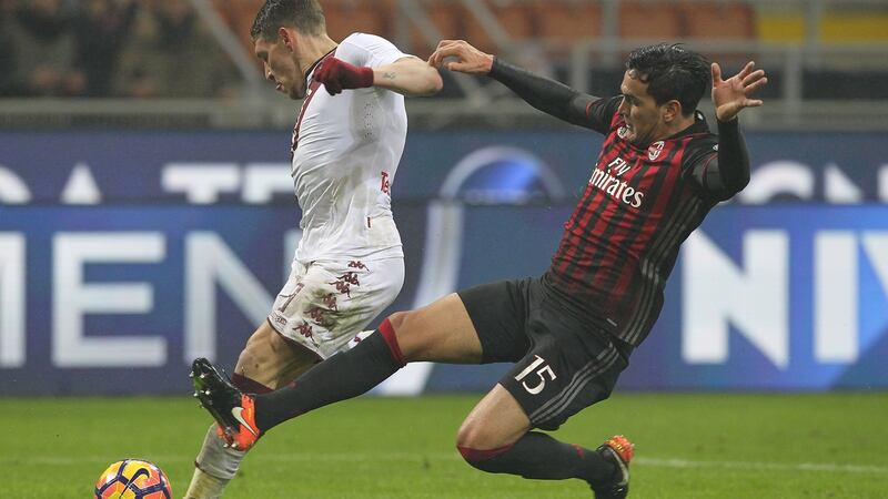 Gustavo Gomez in action for Milan against Torino. Photograph: Marco Luzzani/Getty