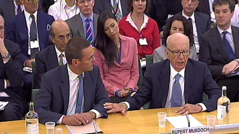 James Murdoch (L) and Rupert Murdoch giving evidence to the Culture, Media and Sport Select Committee in the House of Commons in central London in 2011. Photograph: PA Wire