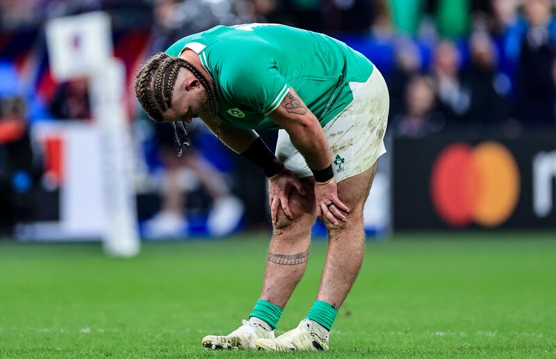 A dejected Finlay Bealham after Ireland's quarter-final defeat by New Zealand at Stade de France. Photograph: Billy Stickland/Inpho