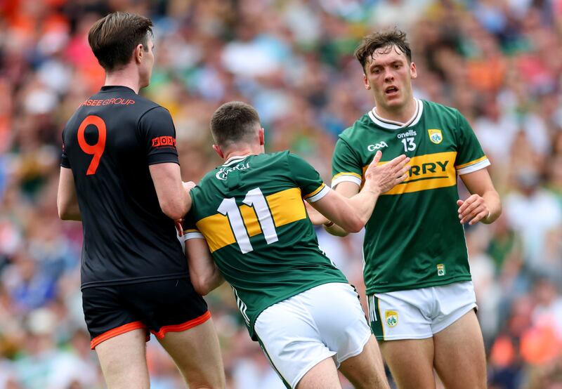 Kerry man of the match Seán O'Shea celebrates a point with David Clifford. Photograph: James Crombie/Inpho