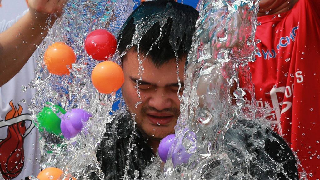The ice bucket challenge was a phenomenon in the summer of 2014. People dunked a bucket of iced water over their heads in order to solicit donations before nominating others to do the same. Photograph: Kim Kyung-Hoon/Reuters