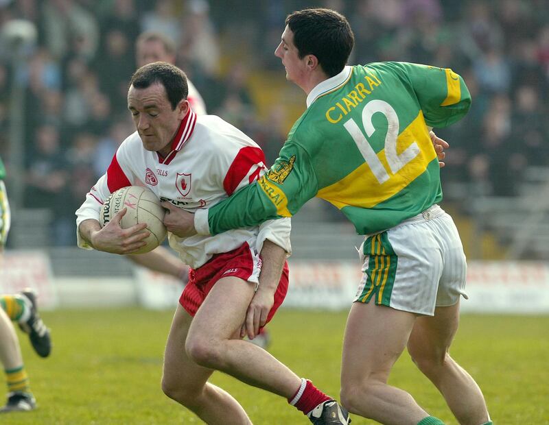 Brian Dooher of Tyrone tackled by Kerry's Paul Galvin during the league clash at Fitzgerald Stadium in Killarney in 2003. Tyrone's victory that day laid down a significant marker for the season. Photograph: Lorraine O'Sullivan/Inpho
