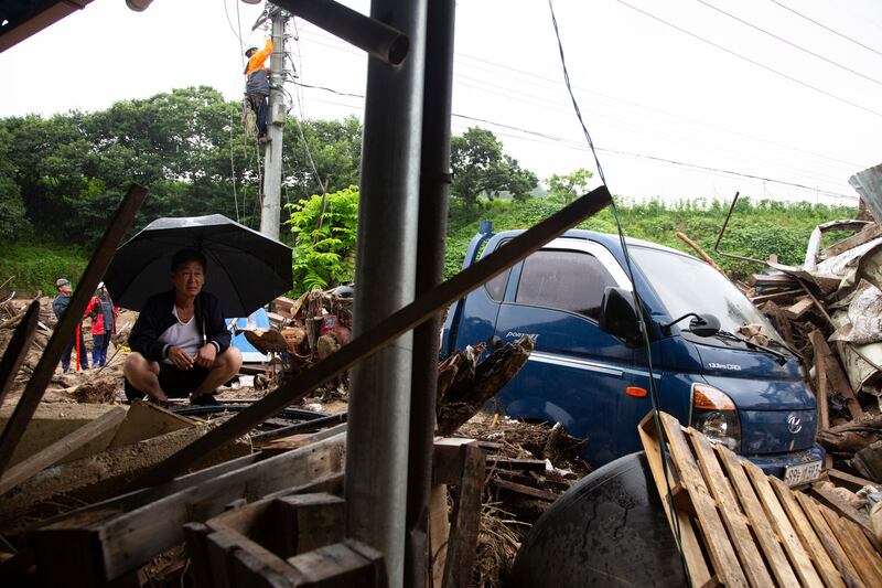 Yun Young-ki (58), the younger brother of missing person Yoon Bo-rae, at the site of a landslide caused by heavy rains in Yecheon-gun, Gyeongsangbuk-do province, South Korea. Photograph: EPA-EFE