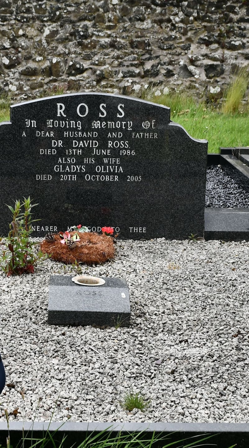 Former hunger striker Laurence McKeown at the grave of Dr David Ross, at Kirkinriola Cemetery. Photograph: Colm Lenaghan/Pacemaker