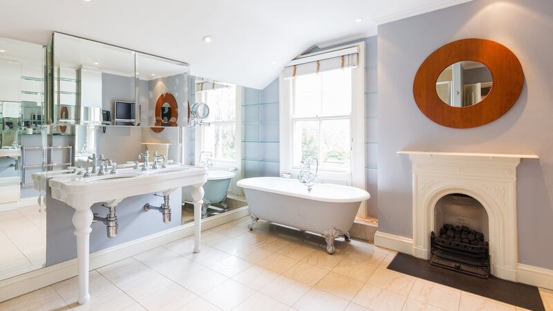 In the top return, what would have been a large bedroom was turned into a luxurious bathroom