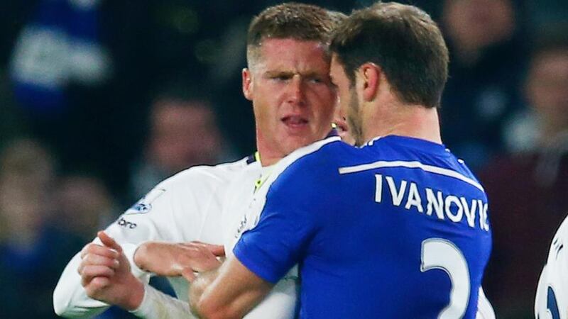 Branislav Ivanovic (right) of Chelsea grapples with Everton’s James McCarthy at Stamford Bridge. Photograph: Eddie Keogh / Reuters