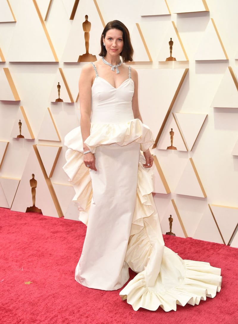Irish actress Caitriona Balfe attends the 94th Oscars at the Dolby Theatre in Hollywood, California on March 27, 2022. (Photo by ANGELA WEISS / AFP) (Photo by ANGELA WEISS/AFP via Getty Images)