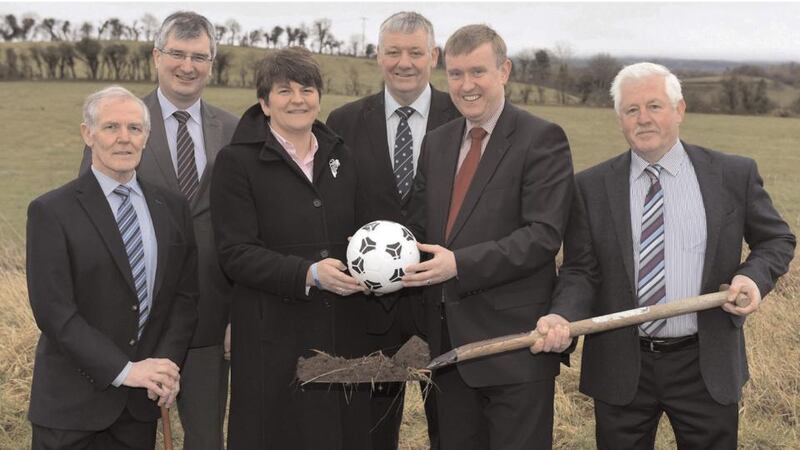 The Northern Ireland Department of Social Development PR photograph featuring Ministers Arlene Foster and Mervyn Storey at Maguirestown Orange Lodge.