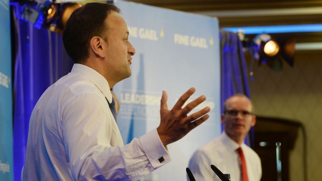 Fine Gael leadership candidates Leo Varadkar and Simon Coveney debate with each other during the hustings, at the Red Cow Hotel in Dublin on Thursday. Photograph: Alan Betson/The Irish Times