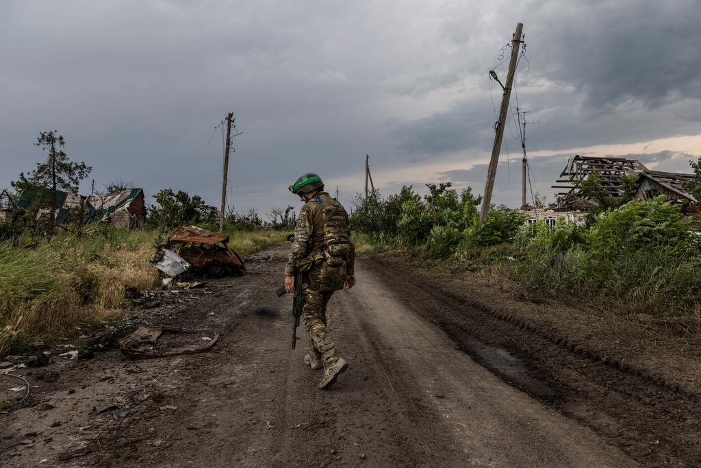 A Ukrainian soldiers in Neskuchne, Ukraine, which was retaken by Ukrainian forces in June. Ukraine’s counteroffensive has been slow, with their forces facing tough resistance from dug-in Russian defenses, mounting casualties and field after field of land mines. Photograph: David Guttenfelder/New York Times