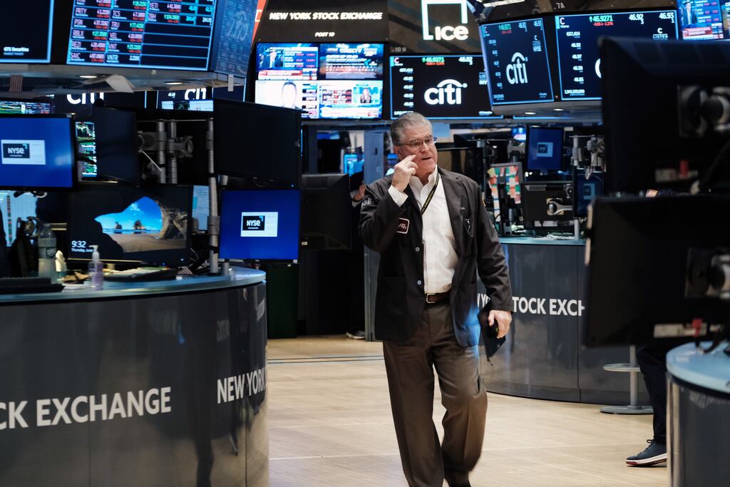 Traders work on the floor of the New York Stock Exchange