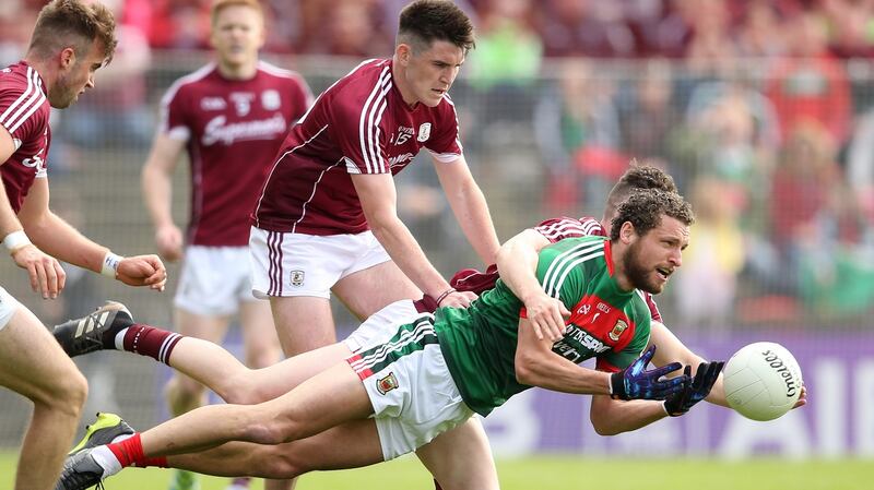 Mayo’s Tom Parsons and Paul Conroy of Galway. Photograph: Cathal Noonan/Inpho