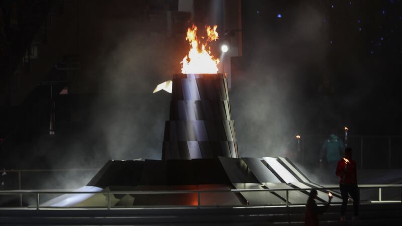 The Olympic flame is lit during the opening ceremony. Photograph: Karim Sahib/AFP/Getty Images