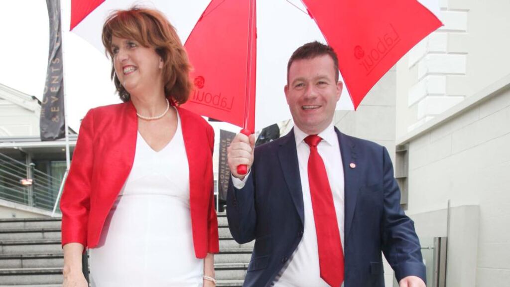 New Labour leader Joan Burton and new deputy leader Alan Kelly at the Mansion House, Dublin, yesterday. Photograph: Collins