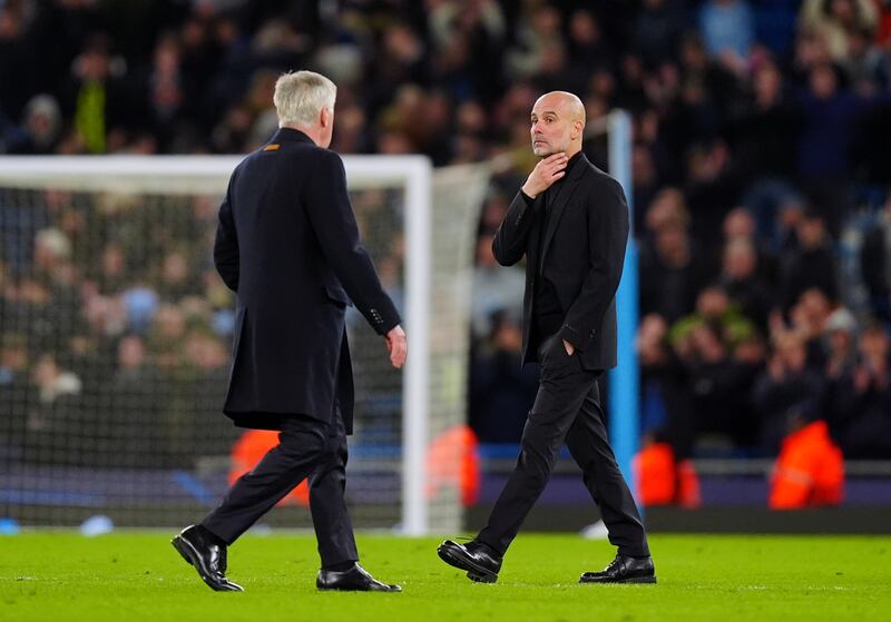 Manchester City manager Pep Guardiola with Real Madrid head coach Carlo Ancelotti following the UEFA Champions League quarter-final, second leg match at the Etihad Stadium. Photograph: Mike Egerton/PA Wire.