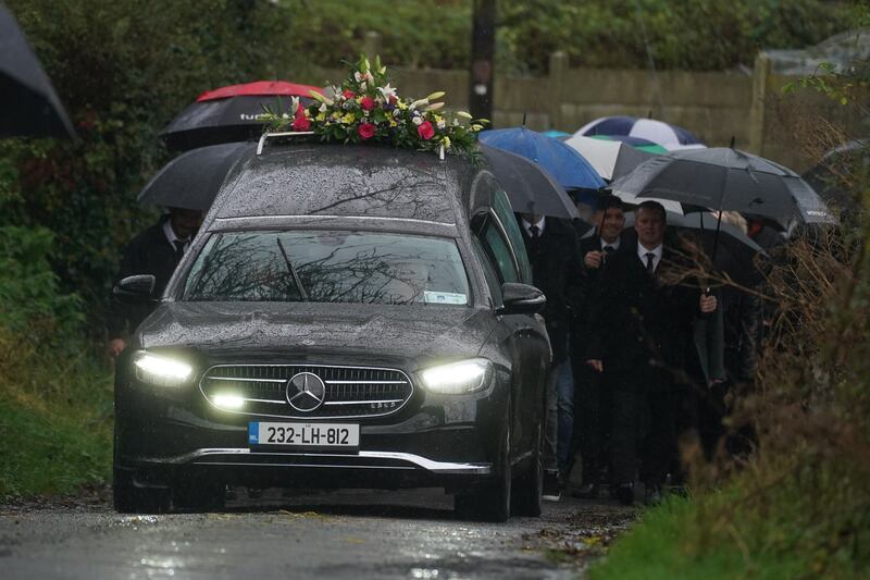The funeral procession arrives at the Church of the Assumption in Tullyallen. Photograph: Brian Lawless/PA Wire