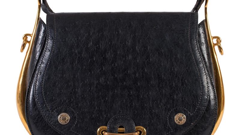 Hermes black-and-gilt model with brass logo buttons (lot 302, €2,800-€3,800)