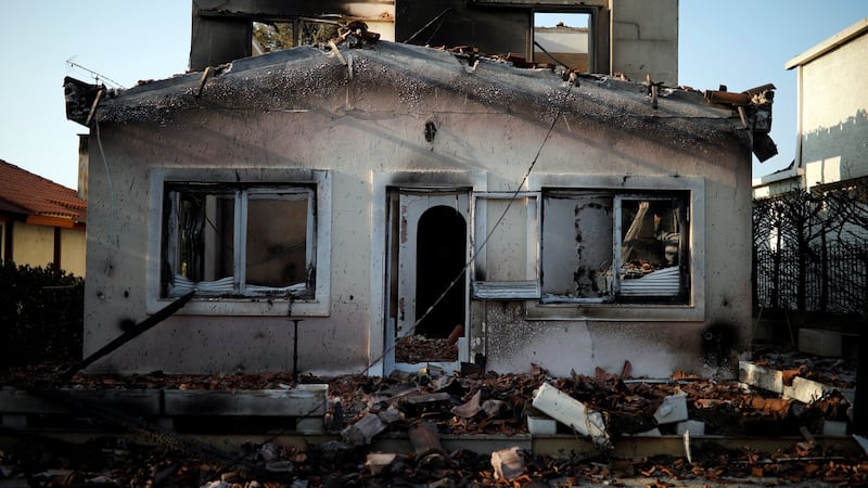 A burnt house following a wildfire at Mati, Greece. Photograph: Alkis Konstantinidis/Reuters
