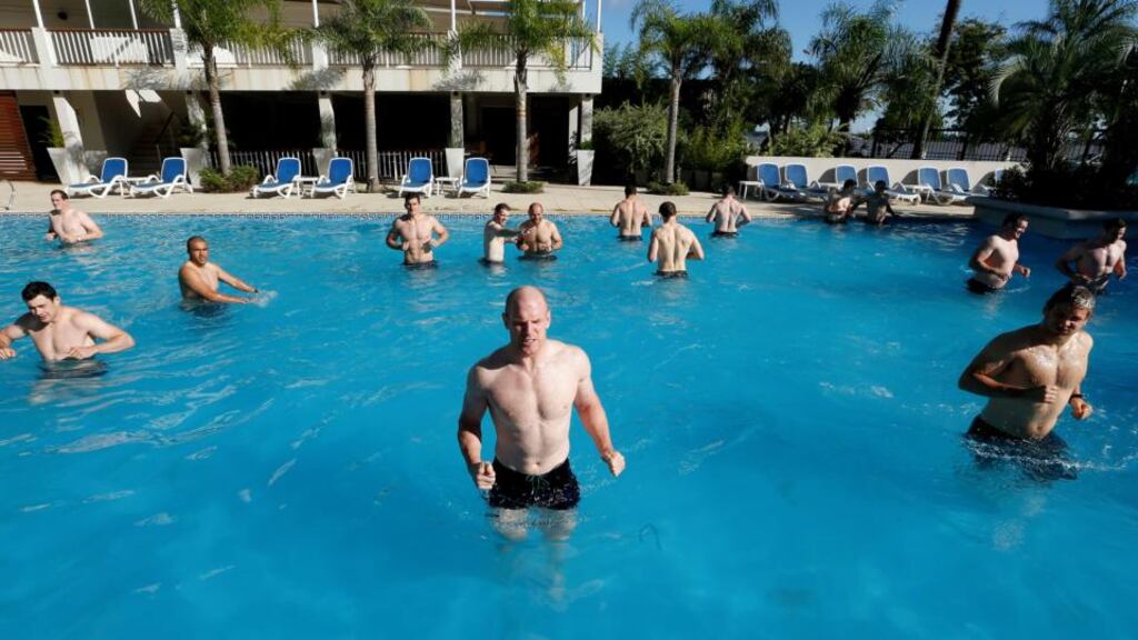 Paul O’Connell and members of the Ireland squad undergo their pool recovey session at the Hotel Turismo Corrientes in Argentina. Photo: Billy Stickland/Inpho