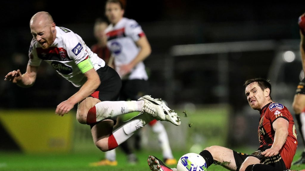 Bohemians’ Michael Barker tackles Chris Shields of Dundalk during the FAI Cup quarter-final at Dalymount Park. Photograph: Laszlo Geczo/Inphp