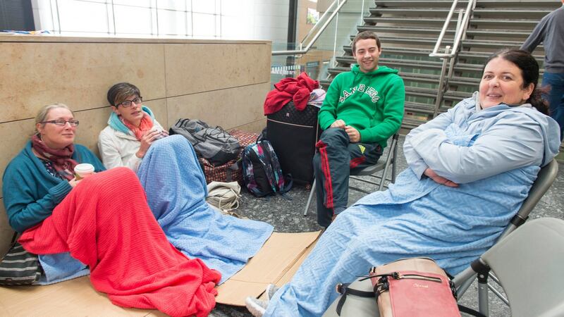 Stranded at Cork Airport were Donna Burke, Maureen Crowley, Adrian Grace and Denise Hourihan amid snowstorm conditions on Thursday.  Photograph: Michael Mac Sweeney/Provision