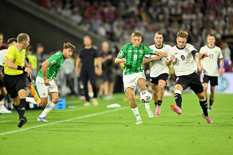 Germany's Joshua Kimmich and Northern Ireland forward Callum Marshall vie for the ball during  last month's World Cup qualifier in Cologne. Photograph: Ina Fassbender/Getty