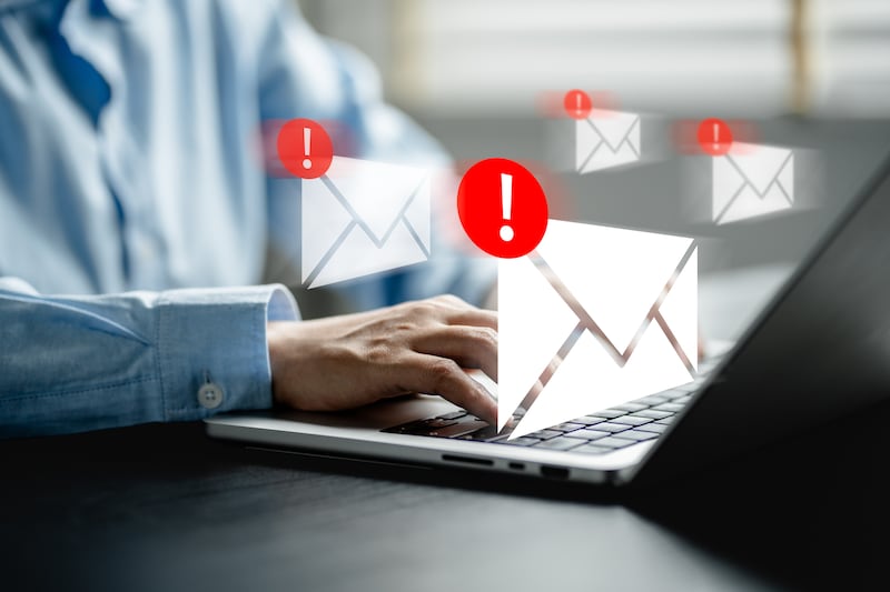 Businesswomen checking email via laptop have spam malware screen alerts, cyber internet web hack attacks, warning errors, sniffing attack, phishing, cybersecurity network concept. Photograph: iStock