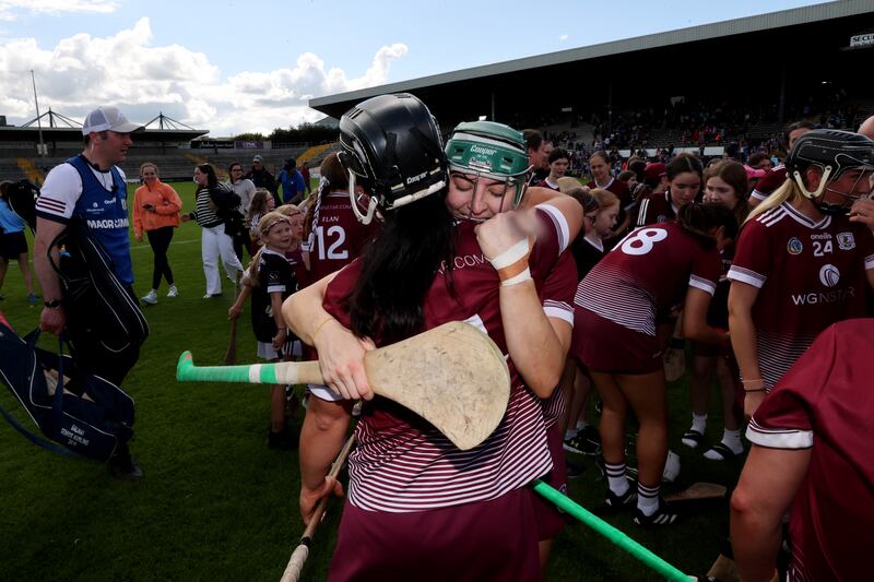 Galway's Niamh Mallon and Dervla Higgins celebrate after the victory over Tipperary in the Glen Dimplex All-Ireland senior camogie championship semi-final at UPMC Nowlan Park. Photograph: Bryan Keane/Inpho