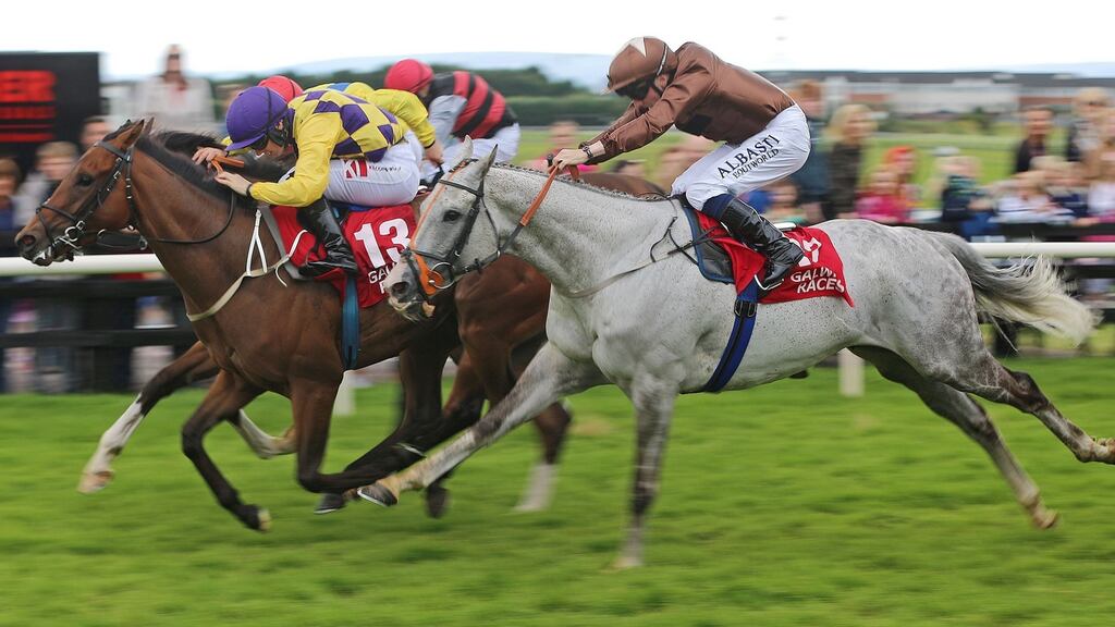 Dream Walker (grey horse) ridden by Chris Hayes on the way to winning ‘Ahonoora’ Handicap during day seven of the Galway Festival at Ballybrit. Photograph: Niall Carson/PA Wire