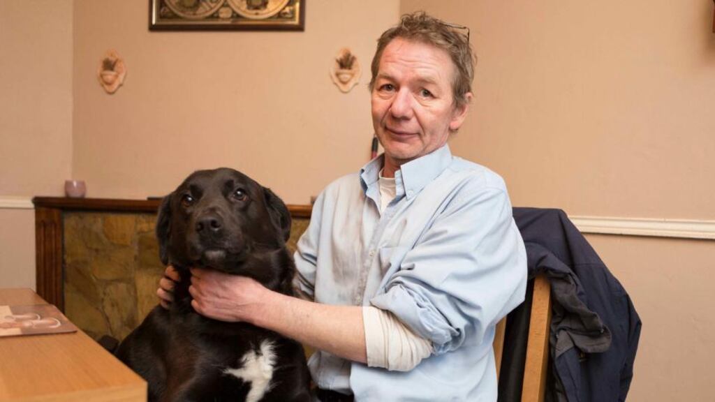 Liam McKee, with dog Tonto, at his home in Cronin Gardens, Shannon, Co Clare. Separated Mr McKee says he has no access to the TV in the house. Photograph: Eamon Ward