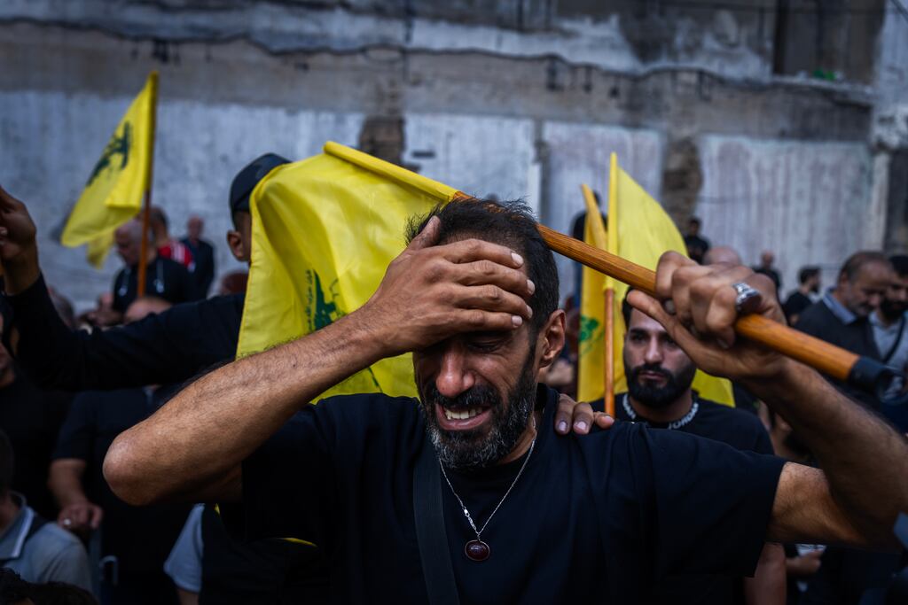 A Hizbullah supporter at a funeral for four people killed in the pager attacks, in Beirut, on Wednesday. Photograph: Diego Ibarra Sánchez/The New York Times