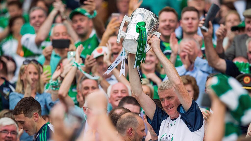 Limerick manager John Kiely lifts the Liam MacCarthy Cup. Photograph: Tommy Dickson/Inpho