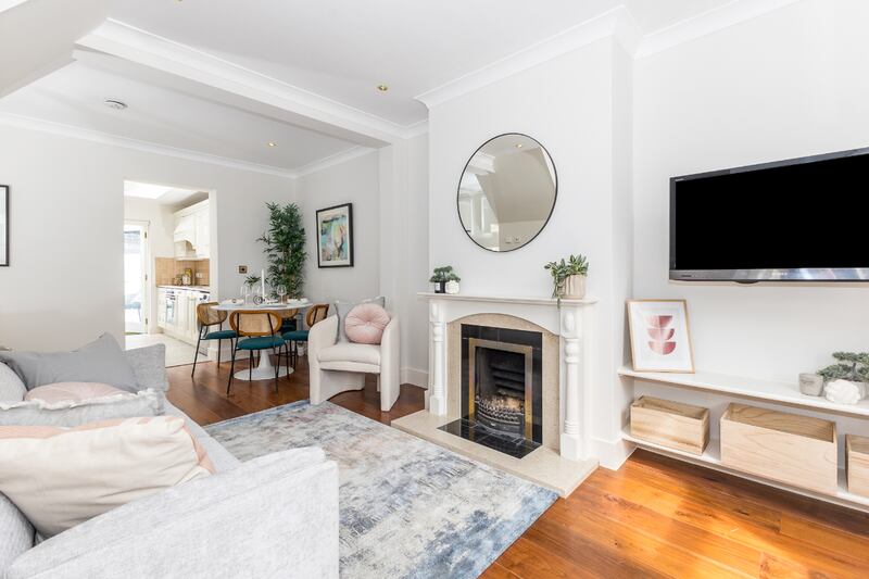 The living area has an open fireplace