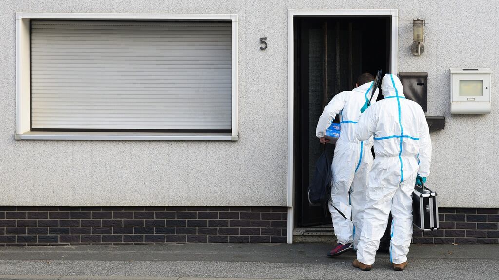 Crime scene investigators at a residential building in Wallenfels, Bavaria on Friday. The bodies of about seven babies were found at the home in the small southern German town. Photograph: Nicolas Armer/EPA