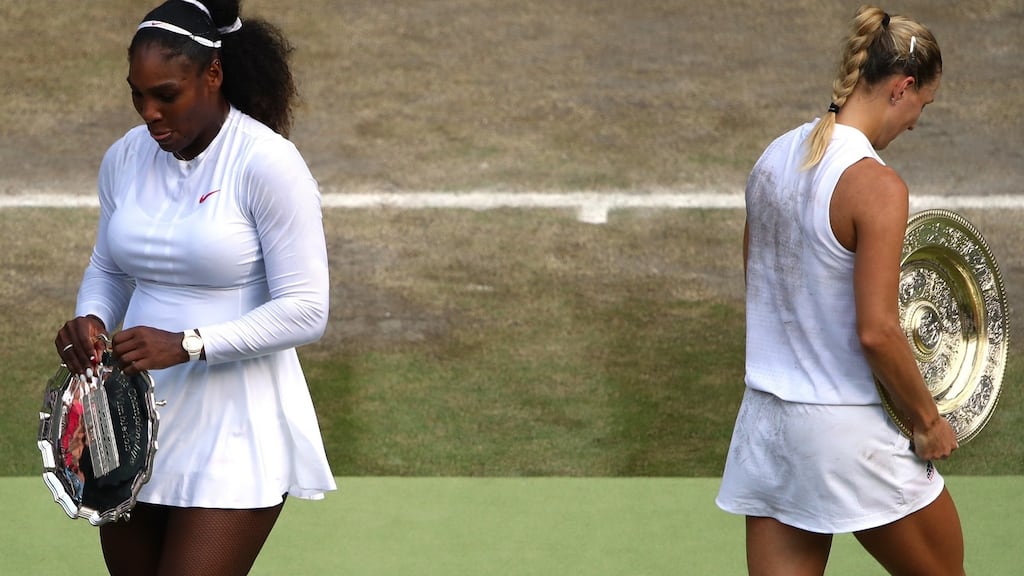 Runner-up Serena Williams and winner Angelique Kerber with the trophies after the women’s singles final at Wimbledon. Photograph: Clive Brunskill/Getty Images