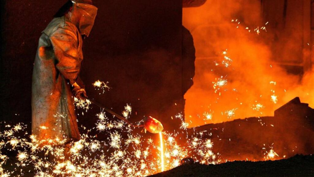A worker at an Arcelor steel plant. The company, which makes 6-7 per cent of global steel and is a broad gauge for the health of the global manufacturing industry, says it believes it had passed the low point of the economic cycle. Photograph: Yves Herman/Reuters
