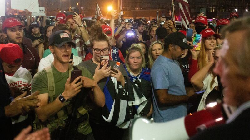 Trump supporters gather to protest the election results at the Maricopa County Elections Department office in Phoenix, Arizona on Wednesday. Photograph: Courtney Pedroza/Getty Images