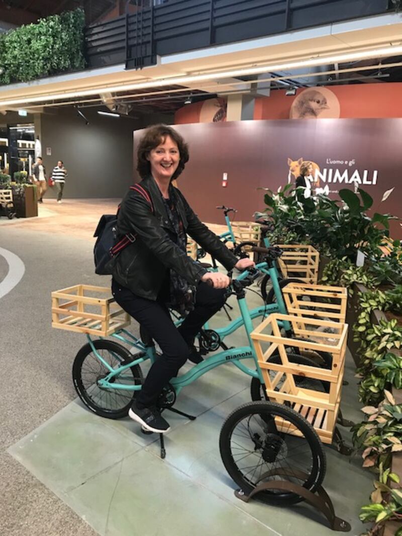 Marie-Claire Digby trying out the Bianchi shopping trikes at FICO Eataly World. The bikes will be fitted with mini-fridges to keep shopping cool