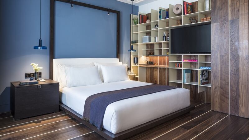 If you like to sleep solo then consider a less balanced bedside table set-up. Invest in a larger unit for your side of the bed, big enough to accommodate all that you need from underwear to accessories.